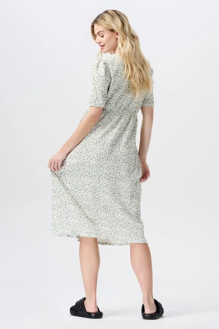 jurk_met_voedingsfunctie__1-31.webp Noppies Jurken | Jurken<Jurk Met Voedingsfunctie Jaelynn - Cream minimal flower